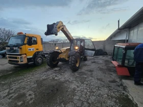 Телескопичен товарач Caterpillar TH408, снимка 5