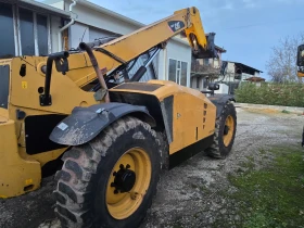Телескопичен товарач Caterpillar TH408, снимка 2
