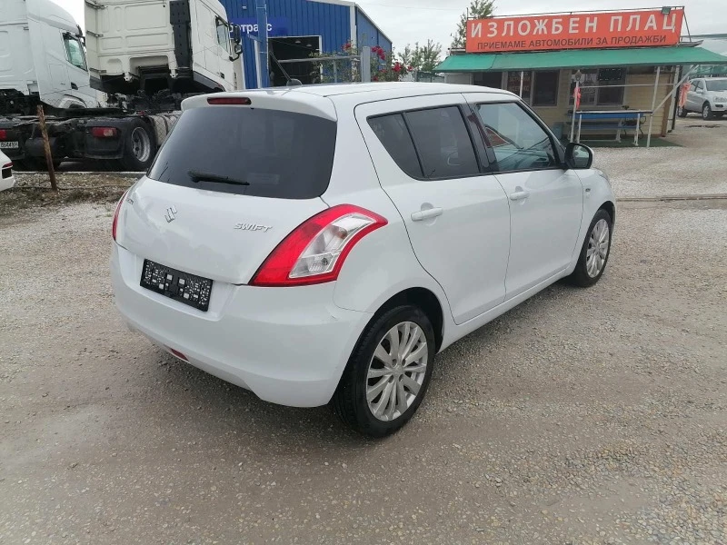 Suzuki Swift 1. 3, снимка 5 - Автомобили и джипове - 45954676