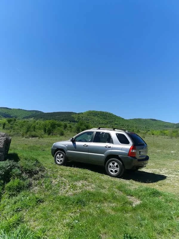 Kia Sportage 2.0 CRDI, снимка 13 - Автомобили и джипове - 56144665