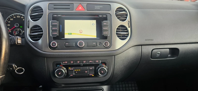 VW Tiguan 2.0 TDI 4 MOTION, снимка 14 - Автомобили и джипове - 52844284