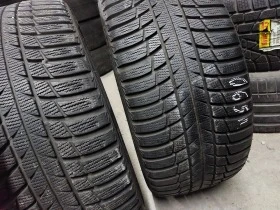 Гуми Зимни 245/40R18, снимка 7 - Гуми и джанти - 39126045