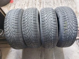 Гуми Зимни 215/70R16, снимка 1 - Гуми и джанти - 38493993