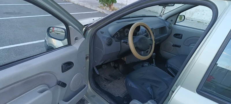 Dacia Logan 1.4 mpi, снимка 8 - Автомобили и джипове - 49416699