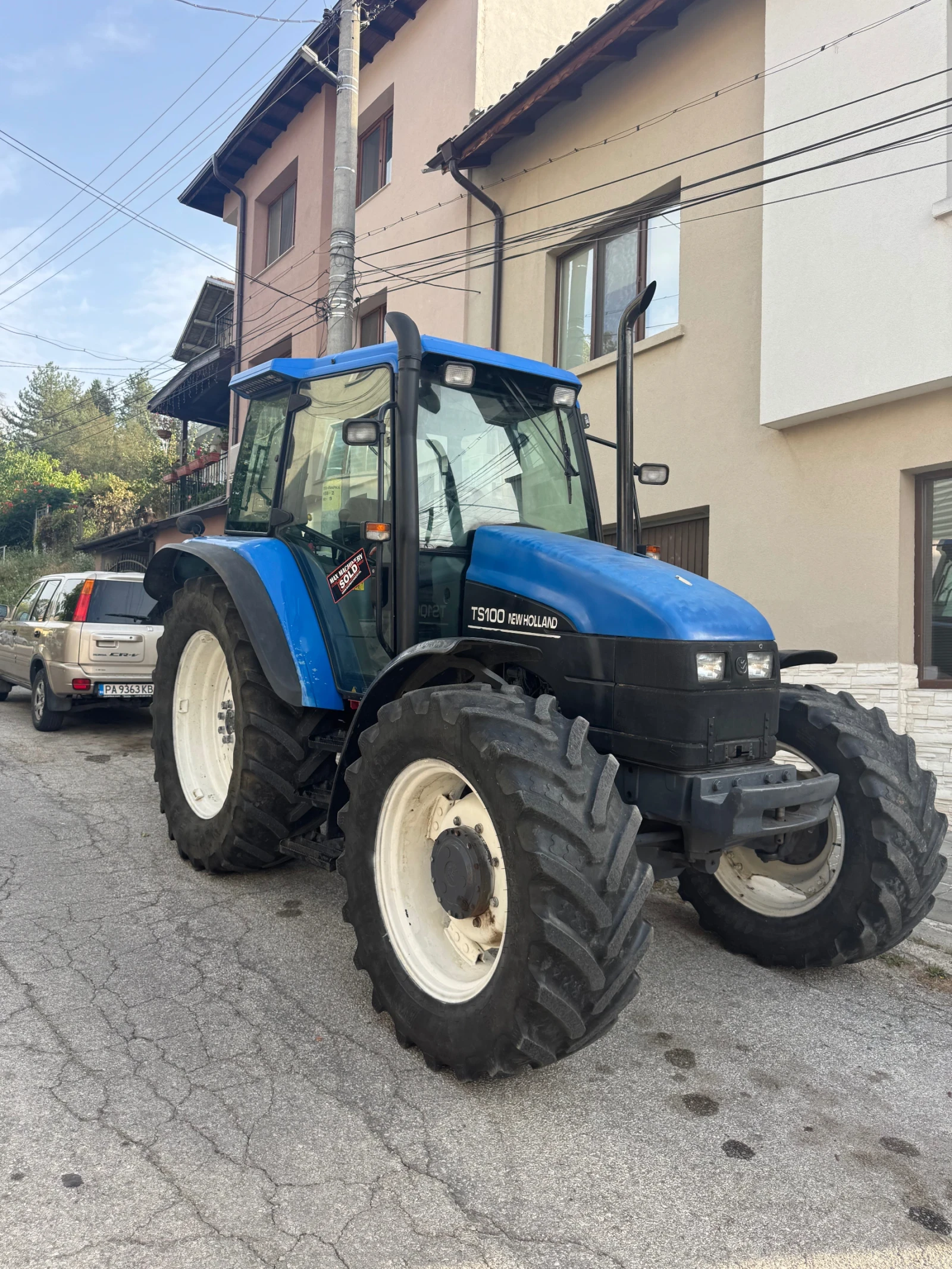 Трактор New Holland TS100