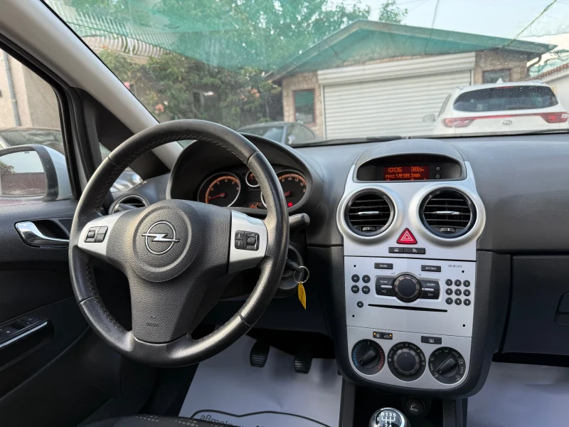 Opel Corsa 1.2I PANORAMA FACELIFT ГАЗОВ ИНЖЕКЦИОН, снимка 11 - Автомобили и джипове - 51114012