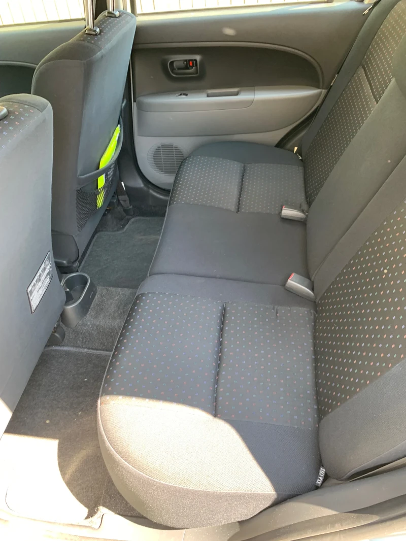 Daihatsu Sirion 1.3-91к.с автоматик 4х4, снимка 9 - Автомобили и джипове - 51782926