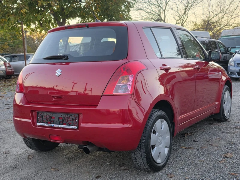 Suzuki Swift 1.3i 4х4 90K.C. / КЛИМАТИК / , снимка 3 - Автомобили и джипове - 52242813