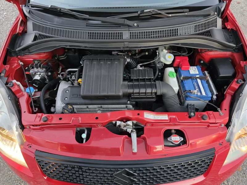 Suzuki Swift 1.3i 4х4 90K.C. / КЛИМАТИК / , снимка 14 - Автомобили и джипове - 52242813
