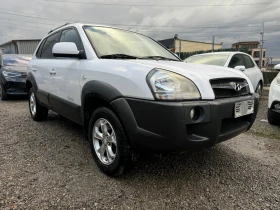 Hyundai Tucson 2.0i 4х4 LPG 140hp-3.2010г-Клима-Кожа-Парктроник, снимка 1