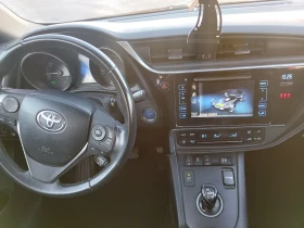 Toyota Auris 1.8 hybrid реални км, снимка 11