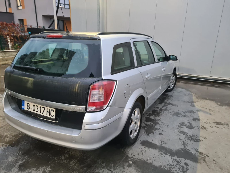 Opel Astra H, снимка 7 - Автомобили и джипове - 48656623