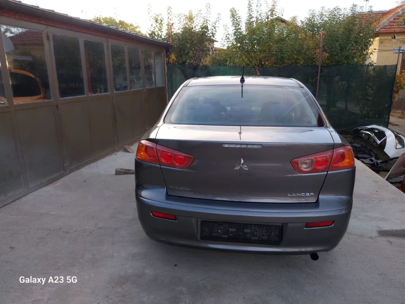 Mitsubishi Lancer 1, 8i швейцария, снимка 7 - Автомобили и джипове - 52484920