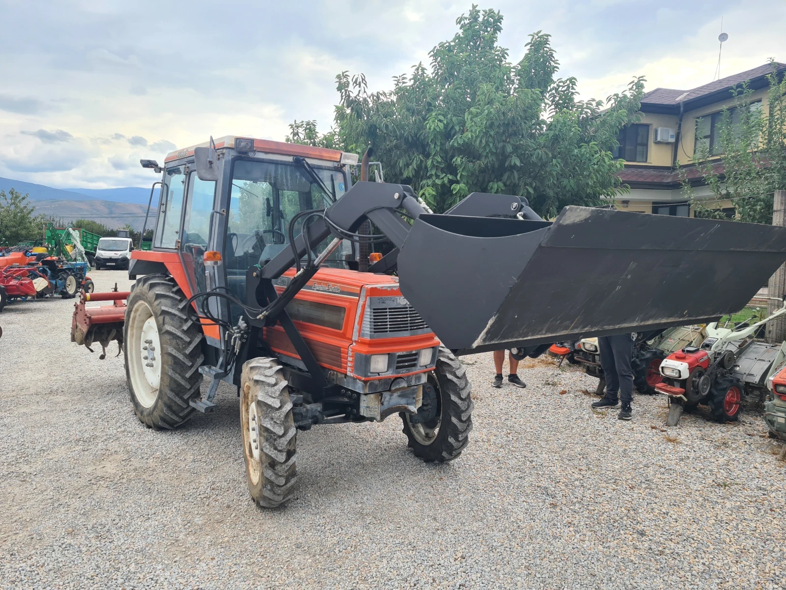 Трактор Kubota M1-65 - изображение 2