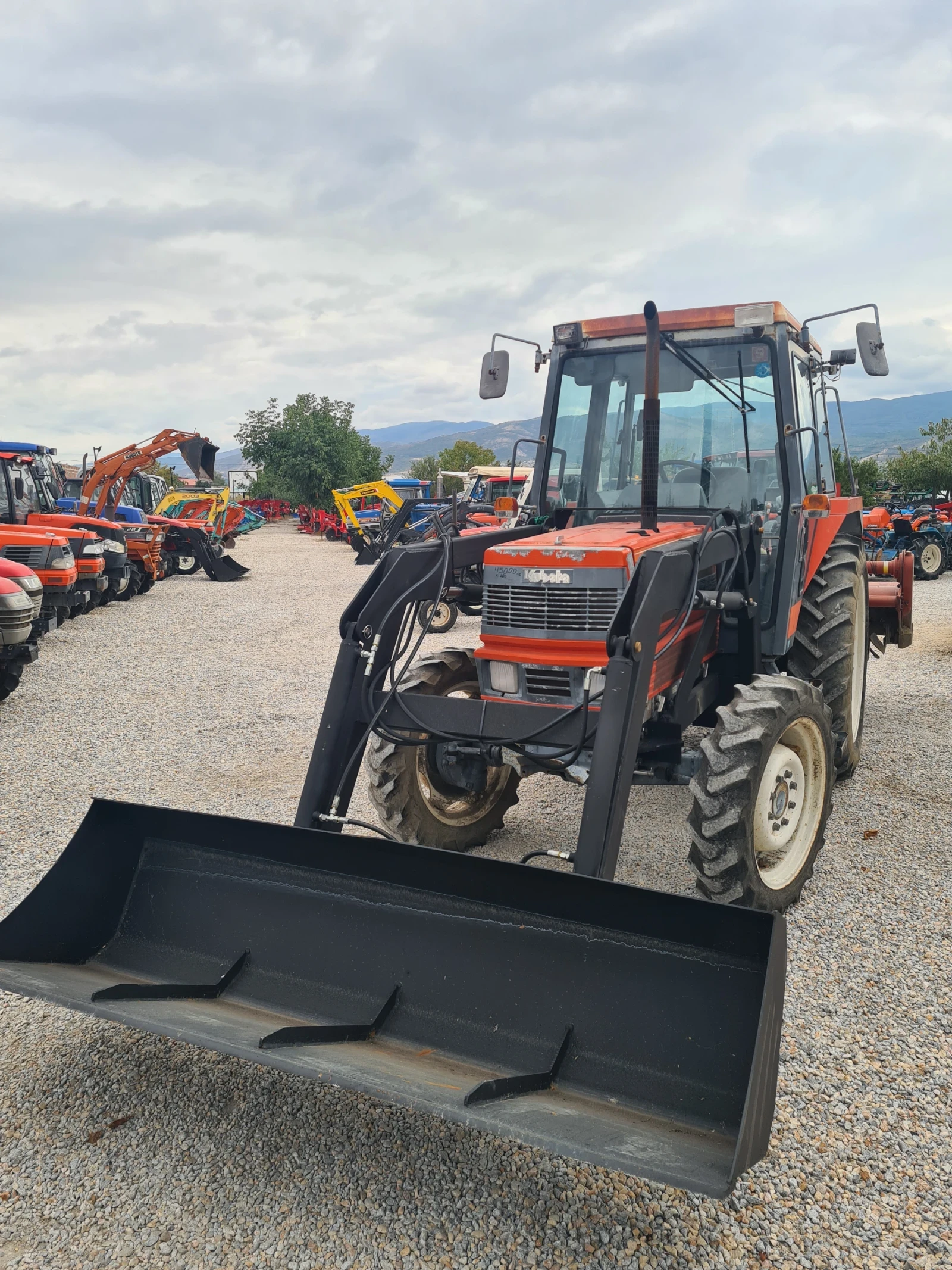 Трактор Kubota M1-65 - изображение 3