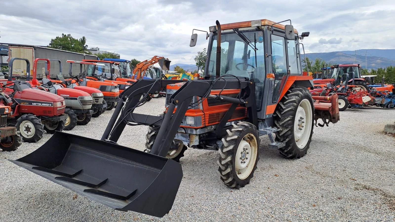 Трактор Kubota M1-65 - изображение 5