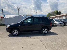 Kia Sportage 2.0 ЧИСТО НОВ-113248 хил.км.-ГАЗ+ БЕНЗИН-4?4, снимка 3