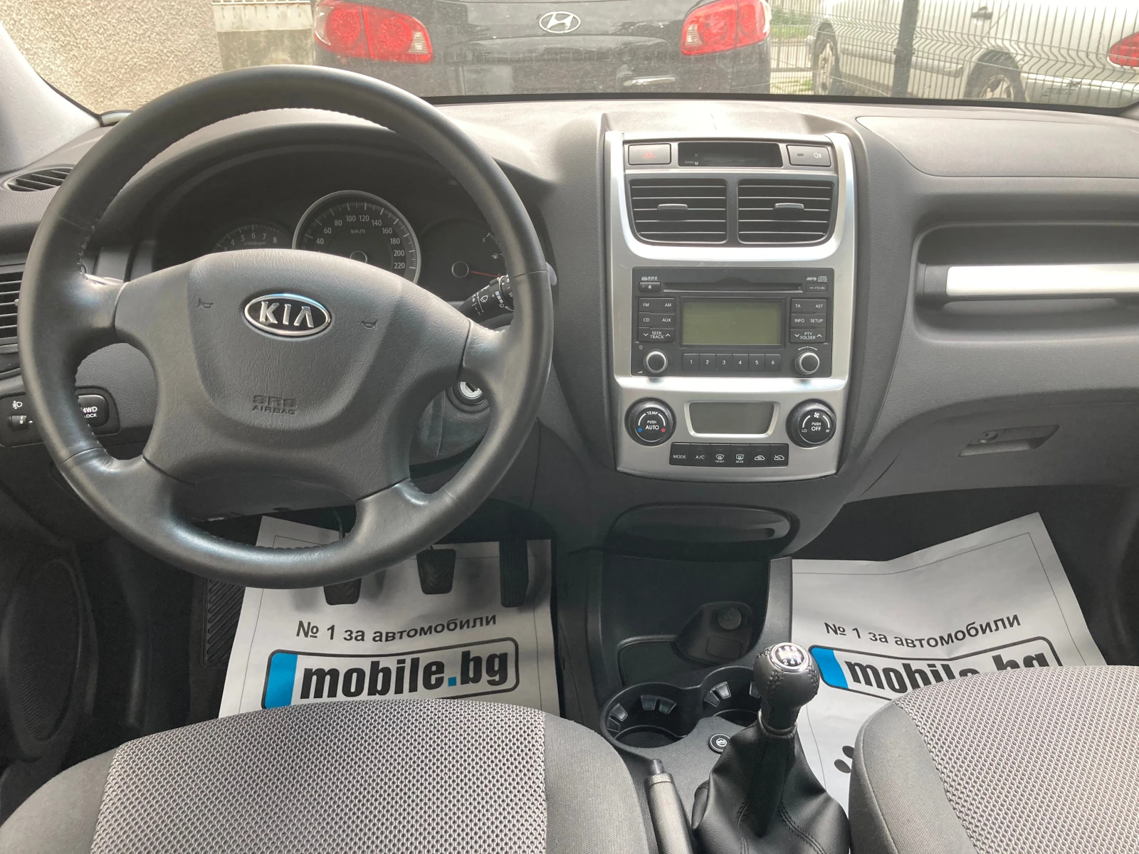 Kia Sportage 2.0 ЧИСТО НОВ-113248 хил.км.-ГАЗ+ БЕНЗИН-4?4, снимка 13 - Автомобили и джипове - 54610396