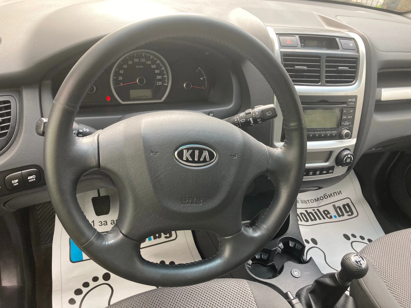 Kia Sportage 2.0 ЧИСТО НОВ-113248 хил.км.-ГАЗ+ БЕНЗИН-4?4, снимка 10 - Автомобили и джипове - 54610396
