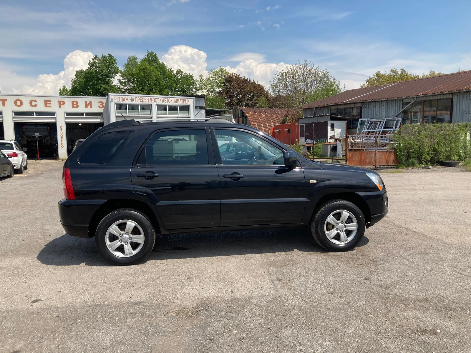 Kia Sportage 2.0 ЧИСТО НОВ-113248 хил.км.-ГАЗ+ БЕНЗИН-4?4, снимка 7 - Автомобили и джипове - 54610396