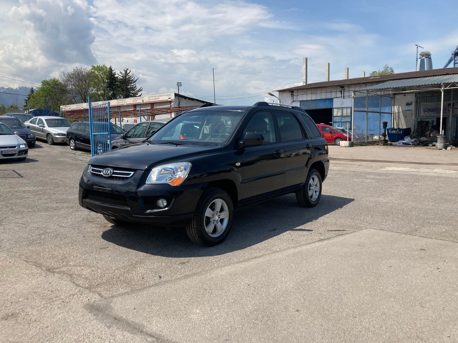 Kia Sportage 2.0 ЧИСТО НОВ-113248 хил.км.-ГАЗ+ БЕНЗИН-4?4, снимка 2 - Автомобили и джипове - 54610396