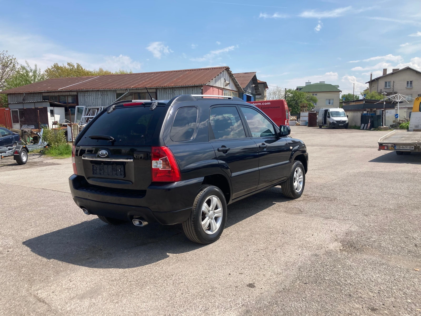 Kia Sportage 2.0 ЧИСТО НОВ-113248 хил.км.-ГАЗ+ БЕНЗИН-4?4, снимка 6 - Автомобили и джипове - 54610396
