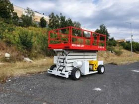 Автовишка Друга марка Holland Lift A151 D/EV  Hybrid, снимка 1