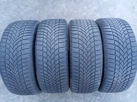 Гуми Зимни 215/55R17, снимка 2 - Гуми и джанти - 48086386