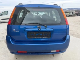 Subaru Justy 1.3/90кс 4х4 Климатик 156000км Сервизни документи , снимка 6 - Автомобили и джипове - 53587862