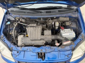 Subaru Justy 1.3/90кс 4х4 Климатик 156000км Сервизни документи , снимка 15 - Автомобили и джипове - 53587862