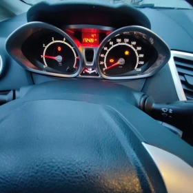 Ford Fiesta 1.25 i* TITANIUM* KLIMATRONIK* EURO 5B*  - 4999 лв. / 2555.95 € - 38358950 10