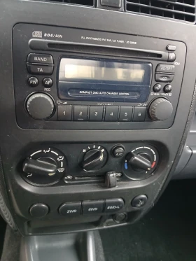 Suzuki Jimny 1.3 i, снимка 10