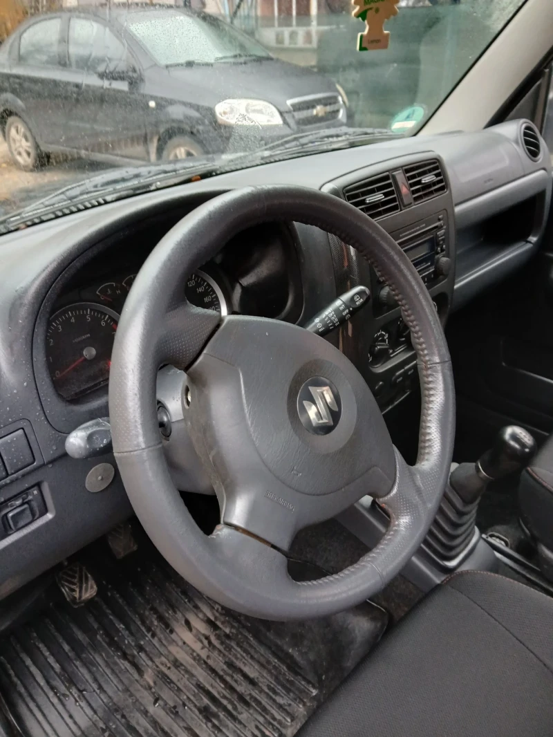 Suzuki Jimny 1.3 i, снимка 12 - Автомобили и джипове - 52959353