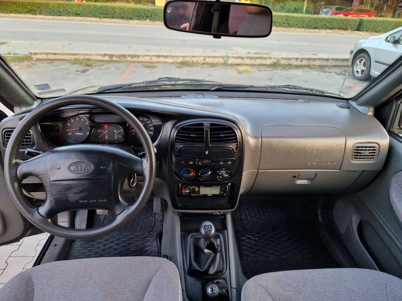 Kia Sportage 2.0i 128 к.с + газ , снимка 11 - Автомобили и джипове - 51131294