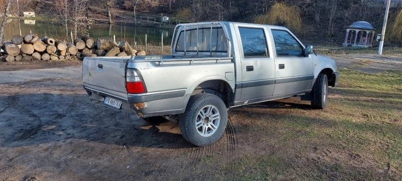 Isuzu D-max 3.1 tdi , снимка 6 - Автомобили и джипове - 44311147