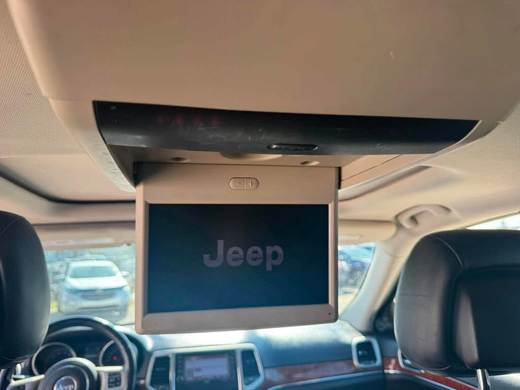 Jeep Grand cherokee Limited 4x4 5.7 * DISTRONIC * ОБДУХ * TV * KAMEPA, снимка 12 - Автомобили и джипове - 55296413