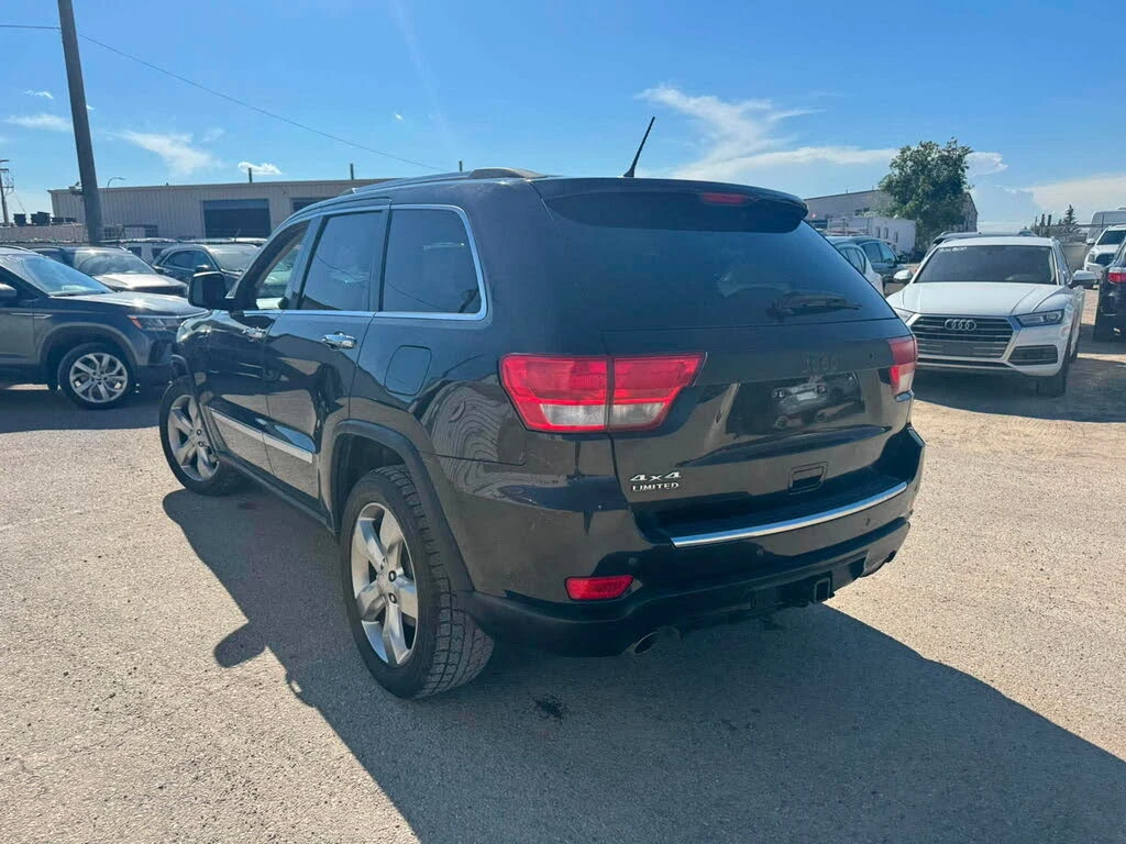 Jeep Grand cherokee Limited 4x4 5.7 * DISTRONIC * ОБДУХ * TV * KAMEPA, снимка 4 - Автомобили и джипове - 55296413