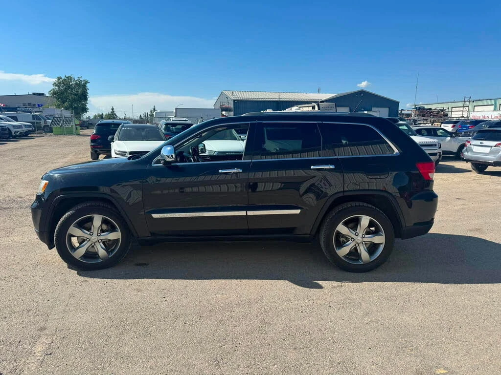Jeep Grand cherokee Limited 4x4 5.7 * DISTRONIC * ОБДУХ * TV * KAMEPA, снимка 2 - Автомобили и джипове - 55296413