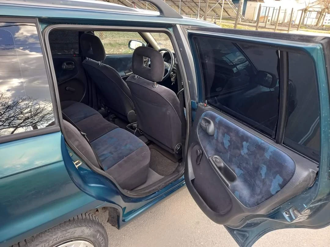 Opel Astra 1.4/82 коня/Климатик , снимка 13 - Автомобили и джипове - 54303420