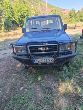 Isuzu Trooper - 2300 € / 4498.41 лв. - 49128331 4