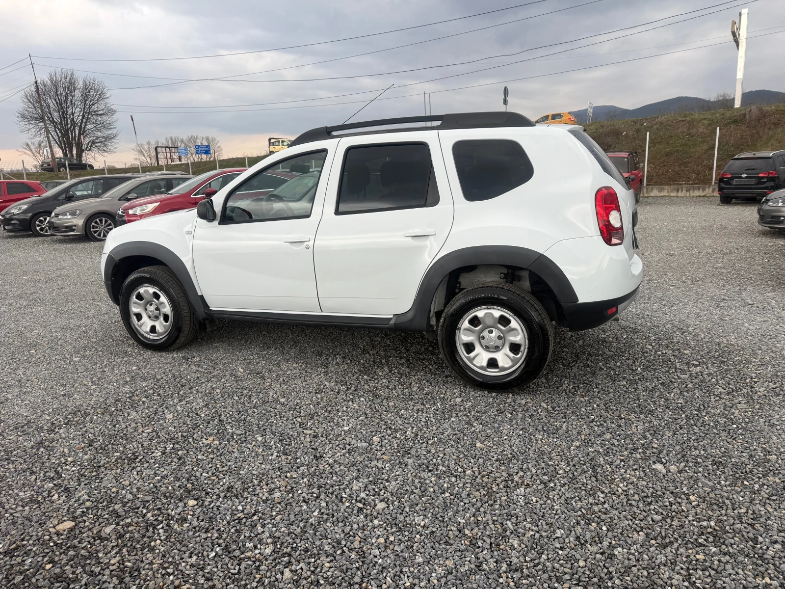 Dacia Duster 1.6 I 4×4 EVRO 5, снимка 7 - Автомобили и джипове - 53965269