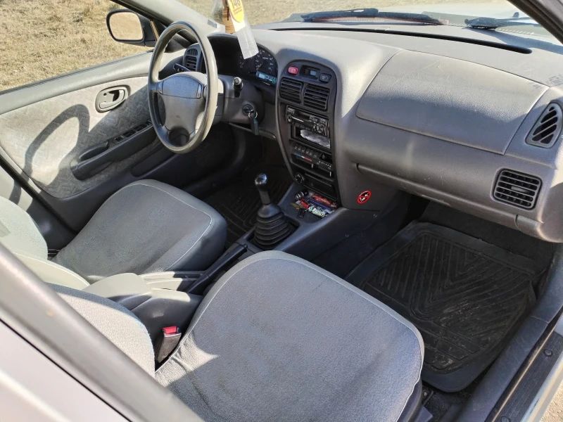 Suzuki Baleno 1.6 i, снимка 8 - Автомобили и джипове - 52998443