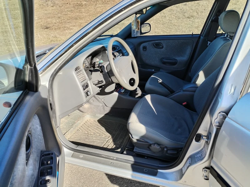 Suzuki Baleno 1.6 i, снимка 6 - Автомобили и джипове - 52998443