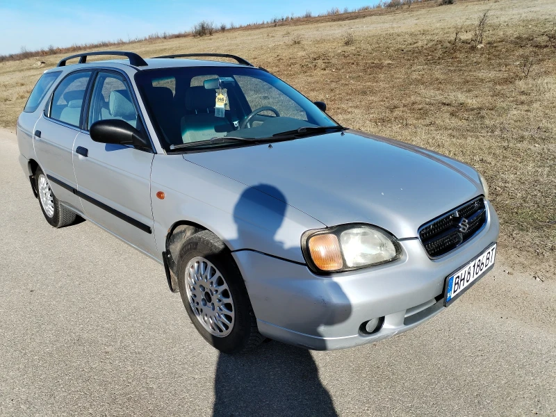 Suzuki Baleno 1.6 i, снимка 14 - Автомобили и джипове - 52998443