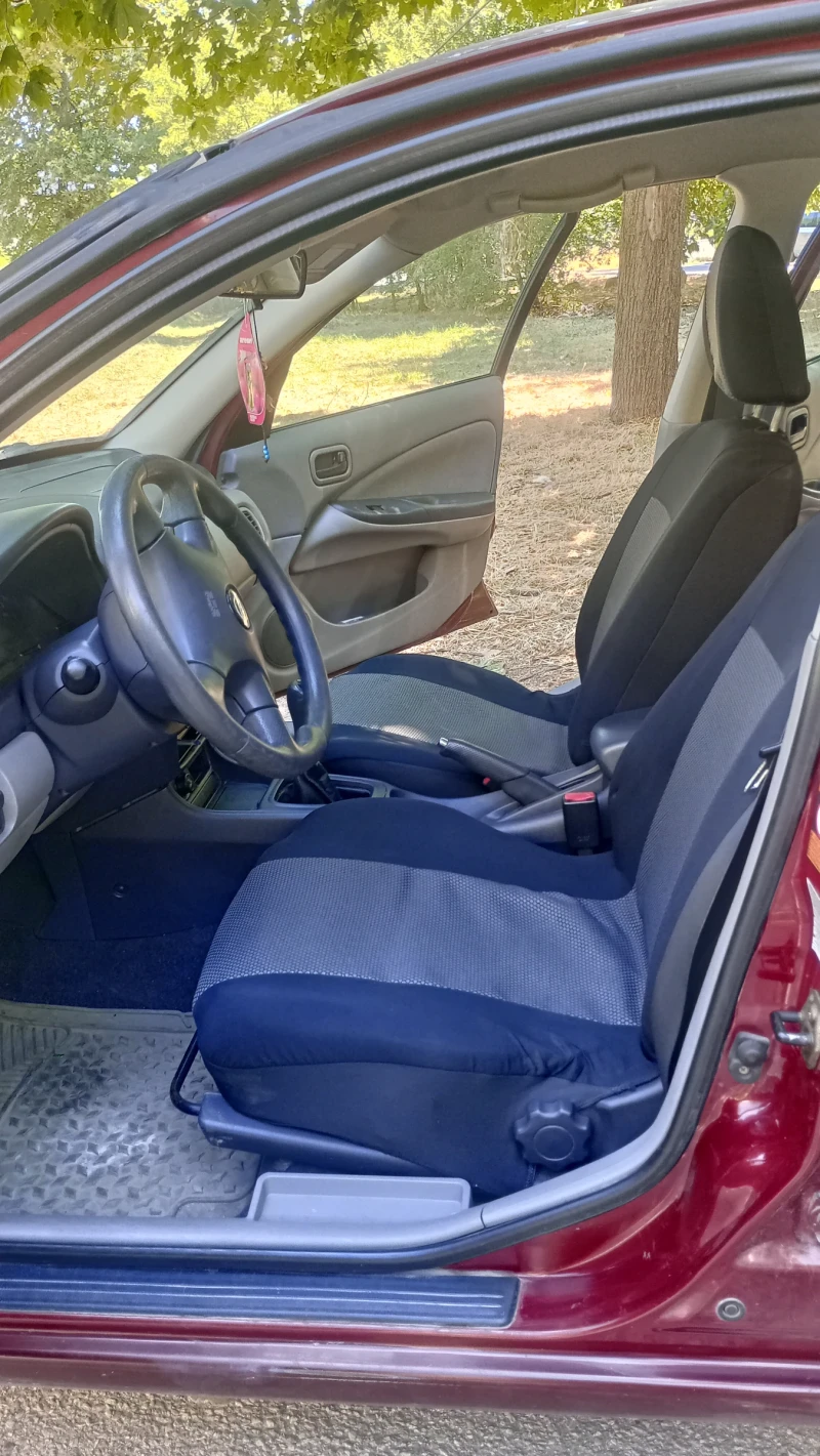 Nissan Almera, снимка 8 - Автомобили и джипове - 52931867