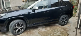 Toyota Rav4 2.5PHEV/306HP/COMFORT+ /4X4/DIGI/NAVI/KLESS/515f - 35200 € / 68845.22 лв. - 56608945 9