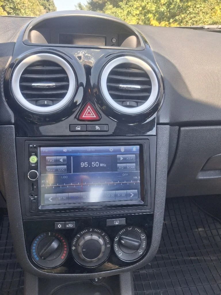 Opel Corsa 1.3 Mjet/CDTI, снимка 11 - Автомобили и джипове - 55740099