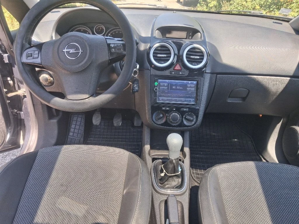 Opel Corsa 1.3 Mjet/CDTI, снимка 8 - Автомобили и джипове - 55740099