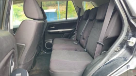 Suzuki Grand vitara 1.9 DDIS KLIMATRON/4X4/БАВНИ СКОРОСТИ, снимка 13
