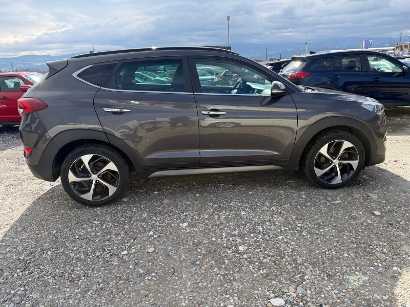 Hyundai Tucson 2.0 CRDI 4X4, снимка 4 - Автомобили и джипове - 53522218